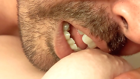 Nurse gives a blowjob to a guy for sex in the bedroom