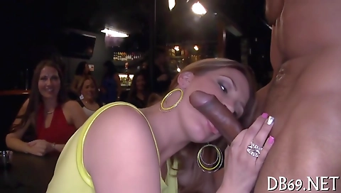 Hot brunette milf fucks two men with her black cock