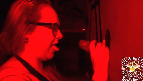 Amateur brunette in a contest with the black man in the front