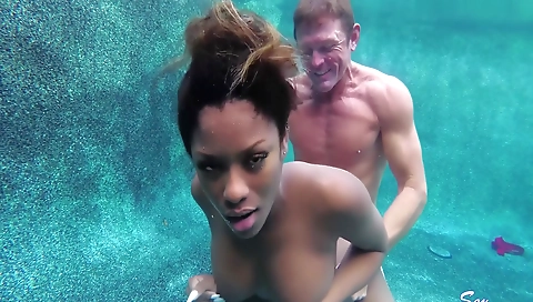 Busty ebony teen with a big booty is getting a facial