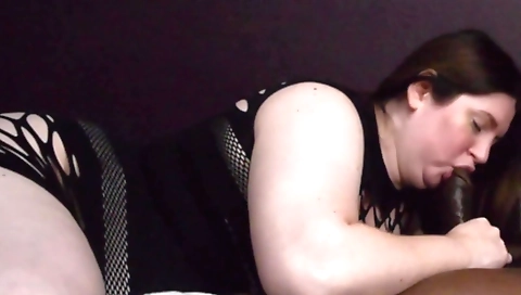 A hot brunette in a red dress gets fucked on the floor