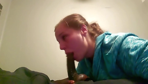 Blonde chick with a shaved pussy giving a deepthroat blowjob