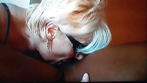 Blonde granny with a big ass and big tits sucking a black cock