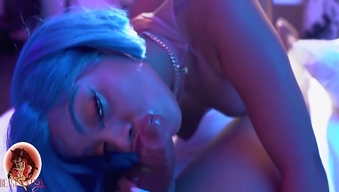 Blonde and ebony girl with a tattooed pussy in a porn video