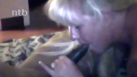 Mature blonde with big fake tits in interracial pov scene