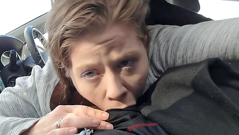 Brunette in the car gets a facial with a black cock